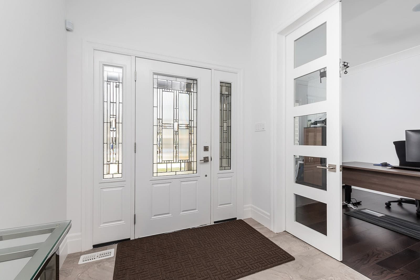 Entry foyer of a Black Cedar home at Foxwood Crossings, London Ontario