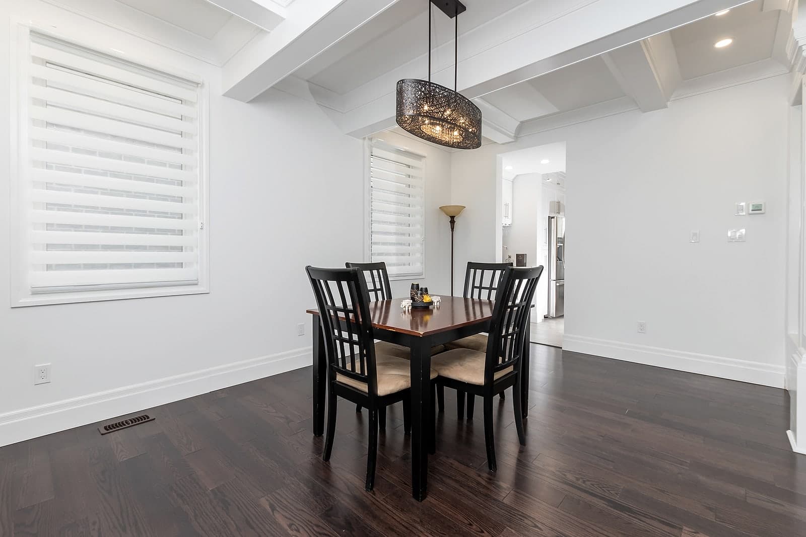 Formal dining room with hardwood floors at Foxwood Crossings