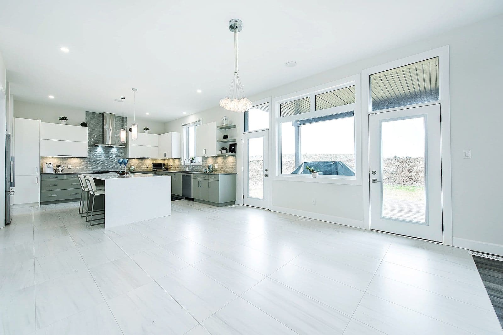 Kitchen with a quartz island open to the living area