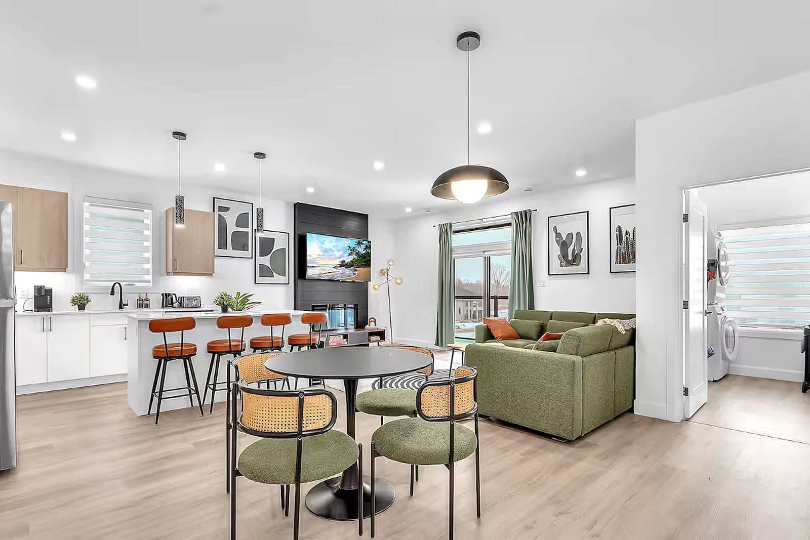 Open-plan dining and living area filled with natural light